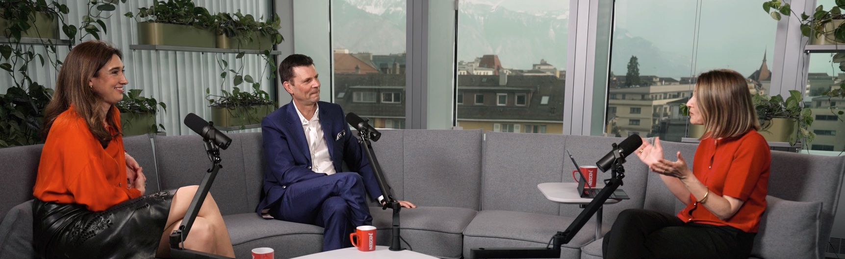 Recording of Nestlé's leadership interview series: three participants with broadcast microphones in a lounge setting at the company's Vevey headquarters